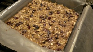 It is important to let the bars cool completely, because they’re a crumbly, goopy mess before they’ve finished cooling.