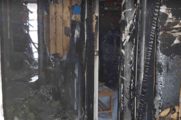 The fire spread throughout the house destroying most of the property, including this hallway.
