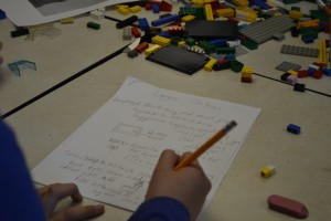 A student creates the lego instruction book photo by Sarah Morales