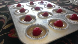 Place the raspberries in the batter with the open ends down, so that the insides don’t dry out in the oven.