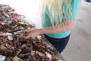The bracelets are made from different threads and come in a variety of different designs and colors. Photo by Kayla Gunn