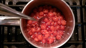 The cherry mixture should be thickened and resemble cherry pie filling.
