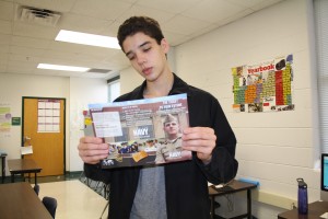 Daniel looking at the ROTC pamphlet. Photo by Vanessa Ramirez 