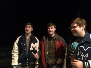 PFC members Ethan Burrows, Shawn McGinnis, and Chris Hale singing at Open Mic Night in order to advertise their concert. Photo by Kayla Gunn