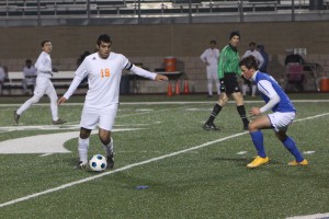 Junior Cameron Piccirilli tries to cut off a Brandeis player's passing lane. Photo by Jacob Dukes