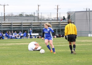 Junior Harley Little evades a defender after knocking her down. Photo by Jacob Dukes