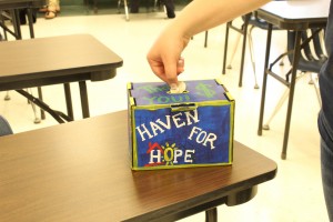 Prom queen nominee India Nikotich's box, decorated and ready to collect donations. Photo by Kayla Gunn.