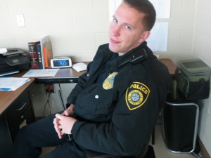 Officer Smith takes a break at his desk. Photo by Aliyah Dixon.