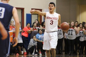 Senior Joshua Paredes calls out to his teammates in a hard-fought 2OT victory against Johnson Tuesday night. Photo by Markell Fernandez