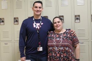 Mr.Macias and Mrs.Chandler stand next to each other. Both are hard of hearing in the right ear. 