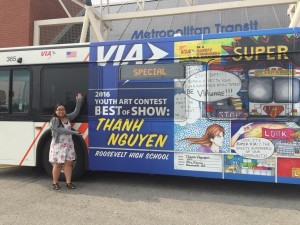 Thanh (Tammy) Nguyen poses next to a VIA bus bearing her artwork. Nguyen won best of show two years in a row. Courtesy Photo. 
