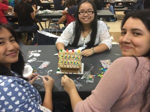 Juniors Janet Thongkam, Ana Linares and Tammy Nguyen with their ginger bread house